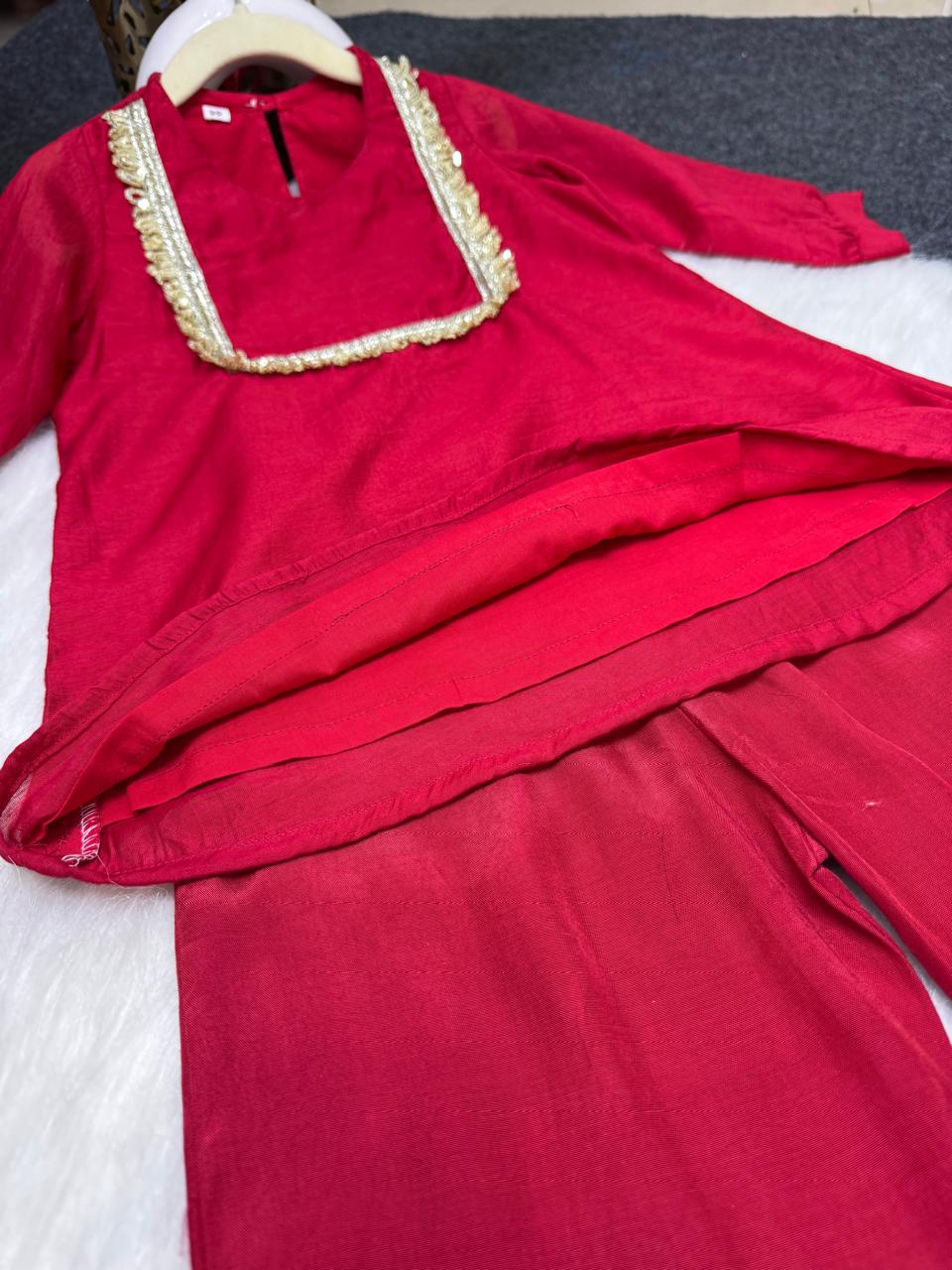 Red co-ord set with golden jhaler work on neck