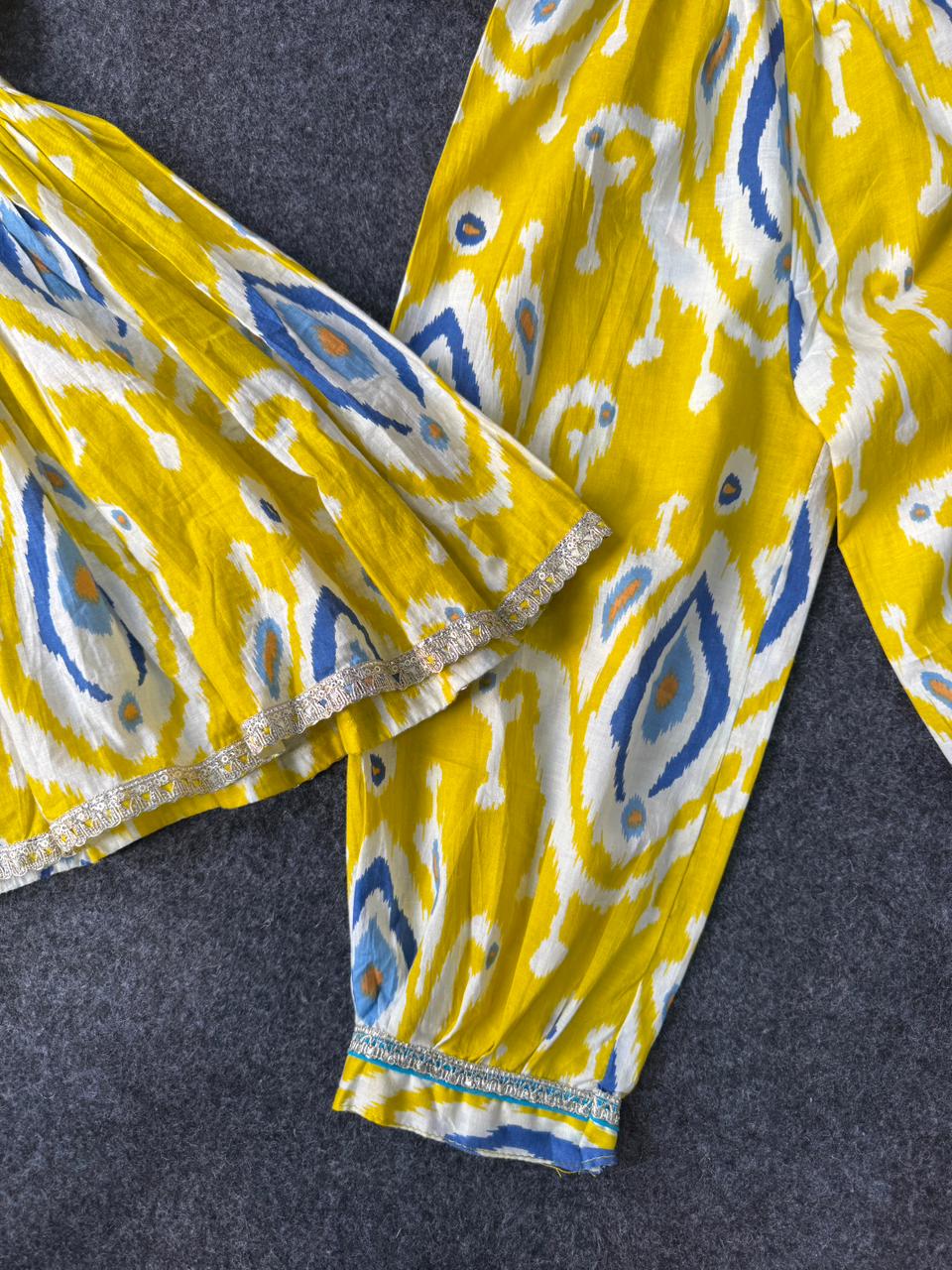 Yellow afghani with peplum lace work on neck