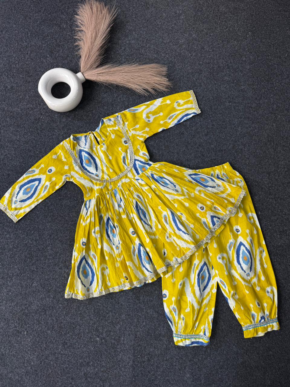 Yellow afghani with peplum lace work on neck