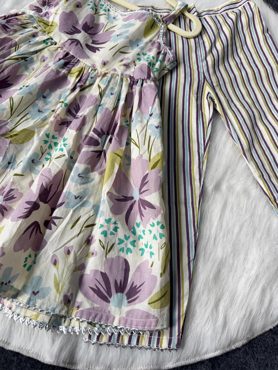 Sleeve less peplum with striped pant