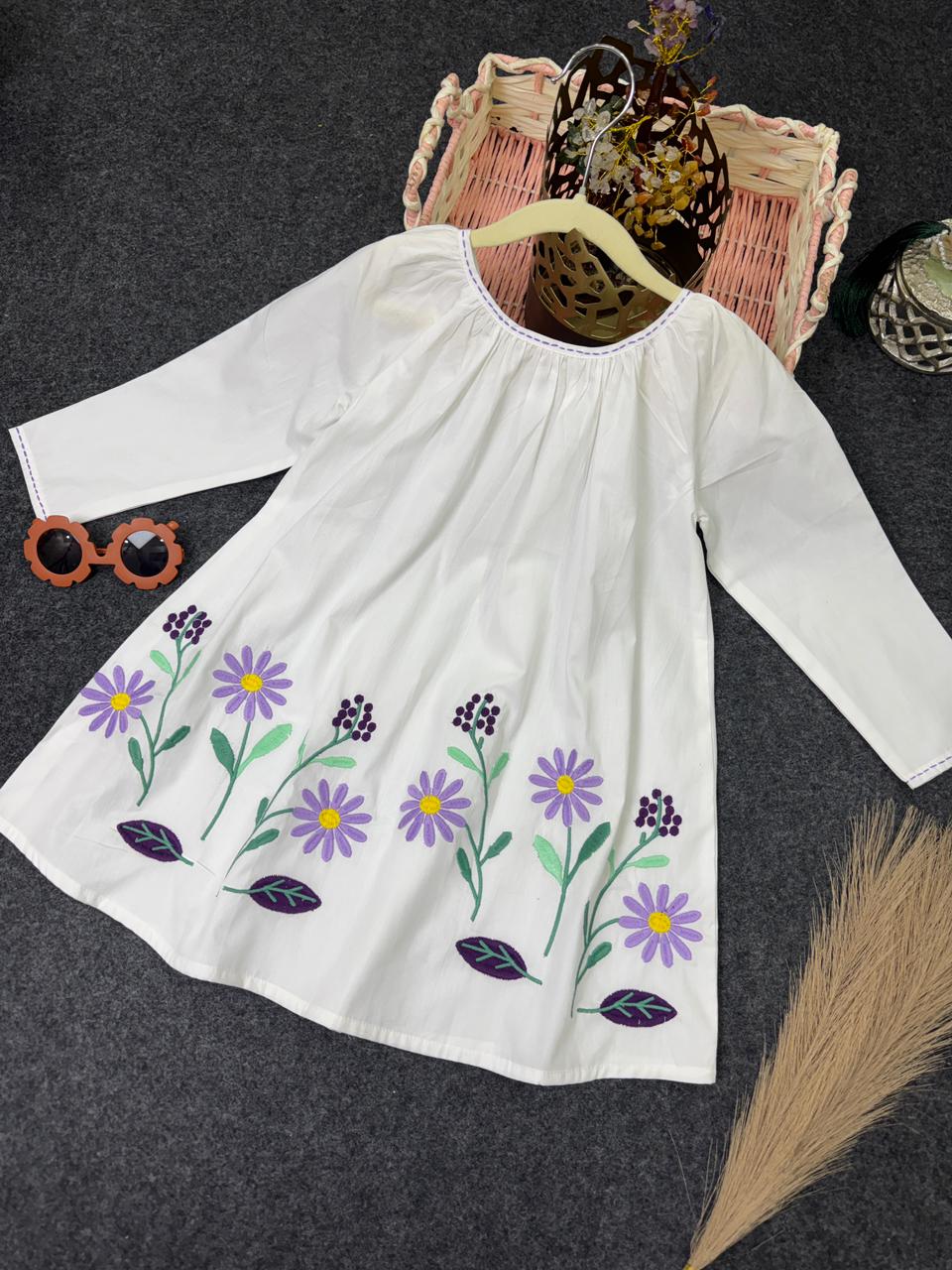 White frock with hand embroidry